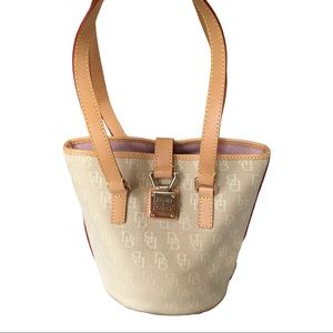 Perfect Dooney and Bourke bag. Tan leather and cream bag. Perfect size.
